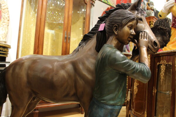 Young Girl and her pony Bronze Statue -  Size: 48"L x 20"W x 48"H.