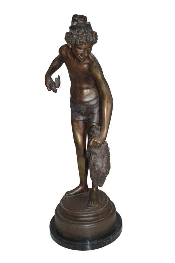 Boy holding a Dog and a Bird Bronze Statue -  Size: 15"L x 15"W x 36"H.