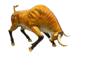 Bull Heads Down -Large Bronze Statue -  Size: 48"L x 12"W x 30"H. 