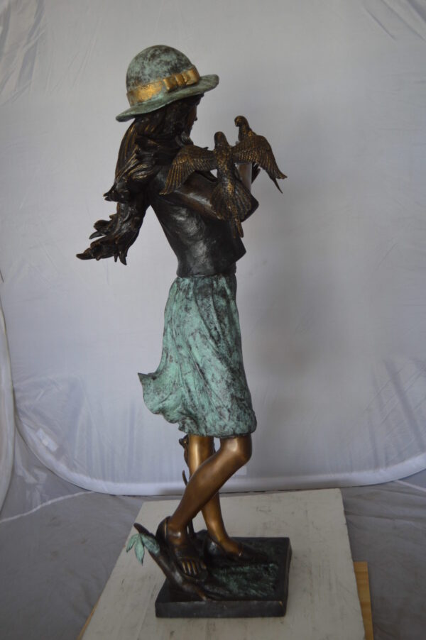 Standing girl with parrots Bronze Statue -  Size: 15"L x 16"W x 41"H.