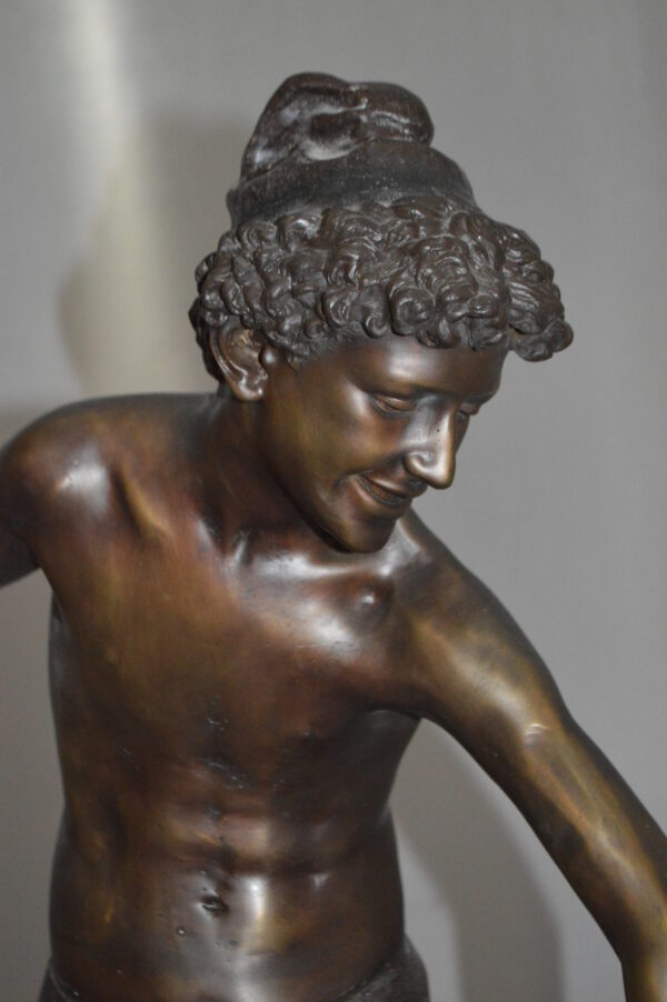 Boy holding a Dog and a Bird Bronze Statue -  Size: 15"L x 15"W x 36"H.