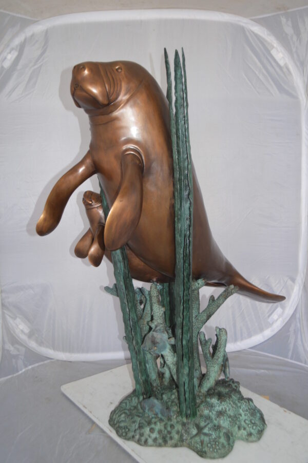 Two Large Manatees swimming Bronze Fountain Statue -  Size: 23"L x 42"W x 42"H.