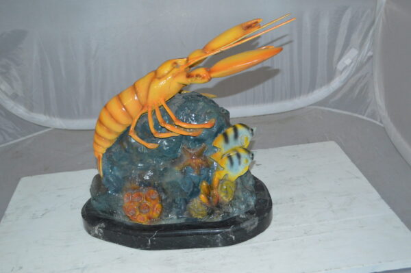 Lobster with Fish Bronze Statue -  Size: 9"L x 18"W x 16"H.