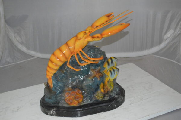 Lobster with Fish Bronze Statue -  Size: 9"L x 18"W x 16"H.