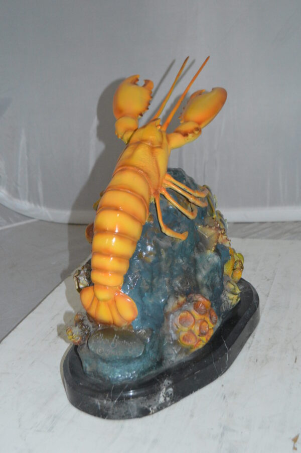 Lobster with Fish Bronze Statue -  Size: 9"L x 18"W x 16"H.