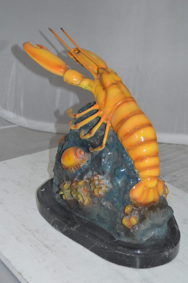 Lobster with Fish Bronze Statue -  Size: 9"L x 18"W x 16"H.