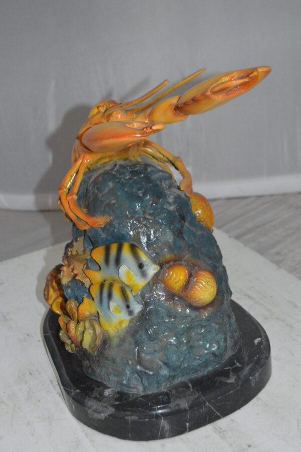 Lobster with Fish Bronze Statue -  Size: 9"L x 18"W x 16"H.