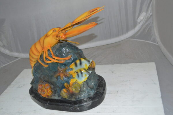 Lobster with Fish Bronze Statue -  Size: 9"L x 18"W x 16"H.