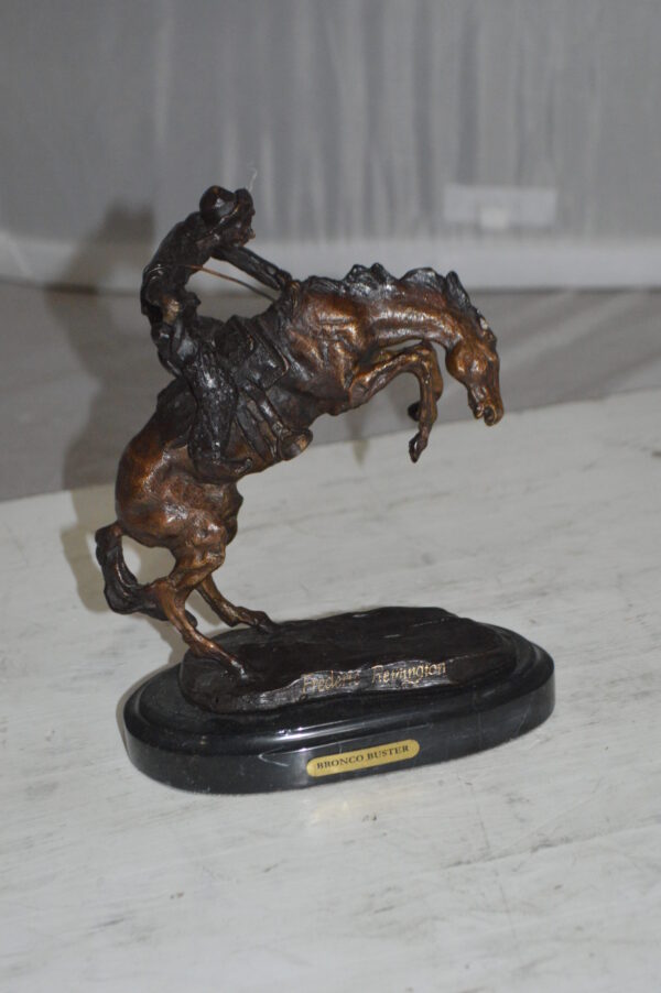 Bronco Buster by Remington Bronze Statue -  3" x 7" x 10"H.