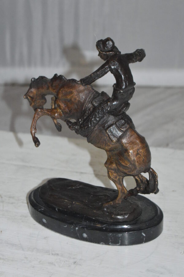 Bronco Buster by Remington Bronze Statue -  3" x 7" x 10"H.