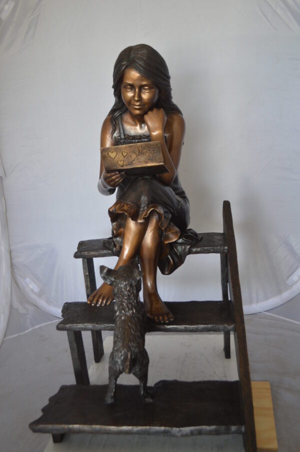 Girl Reading Letters on the Stairs Bronze Statue -  Size: 32"L x 22"W x 40"H.