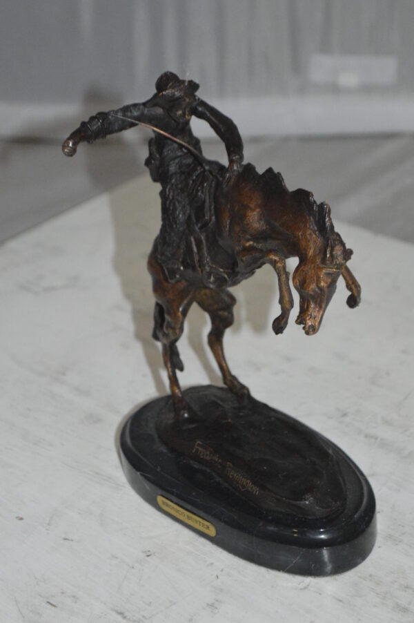 Bronco Buster by Remington Bronze Statue -  3" x 7" x 10"H.