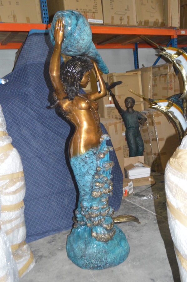 Mermaid holding a shell - large Bronze Statue -  Size: 43"L x 30"W x 76"H.
