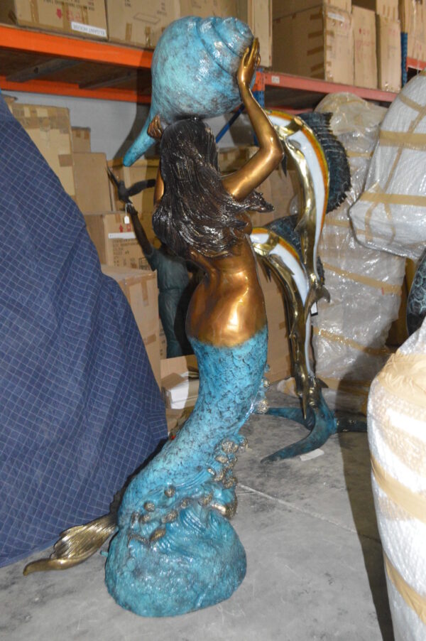 Mermaid holding a shell - large Bronze Statue -  Size: 43"L x 30"W x 76"H.