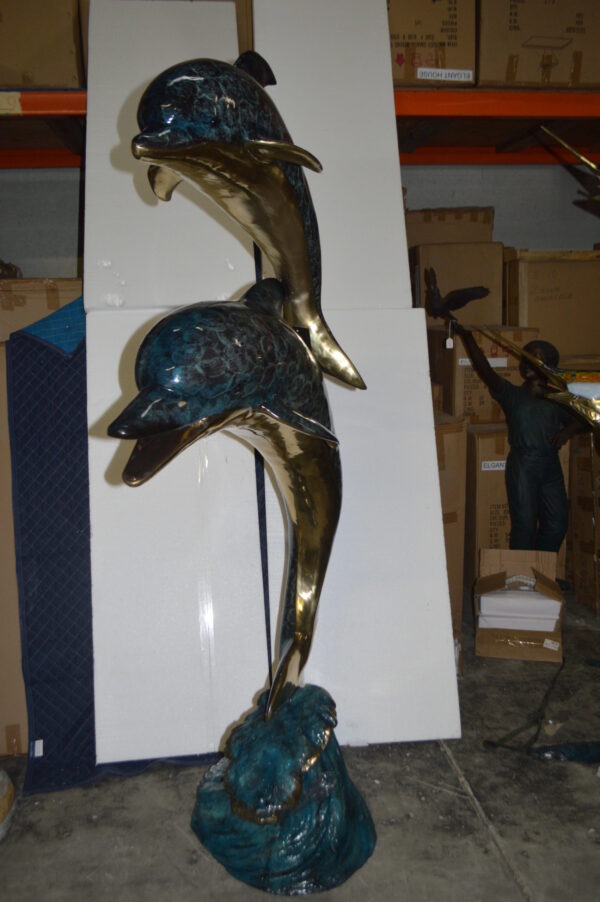 Two Dolphins Overreach Others on Waves Bronze Statue -  44"L x 23"W x 76"H.