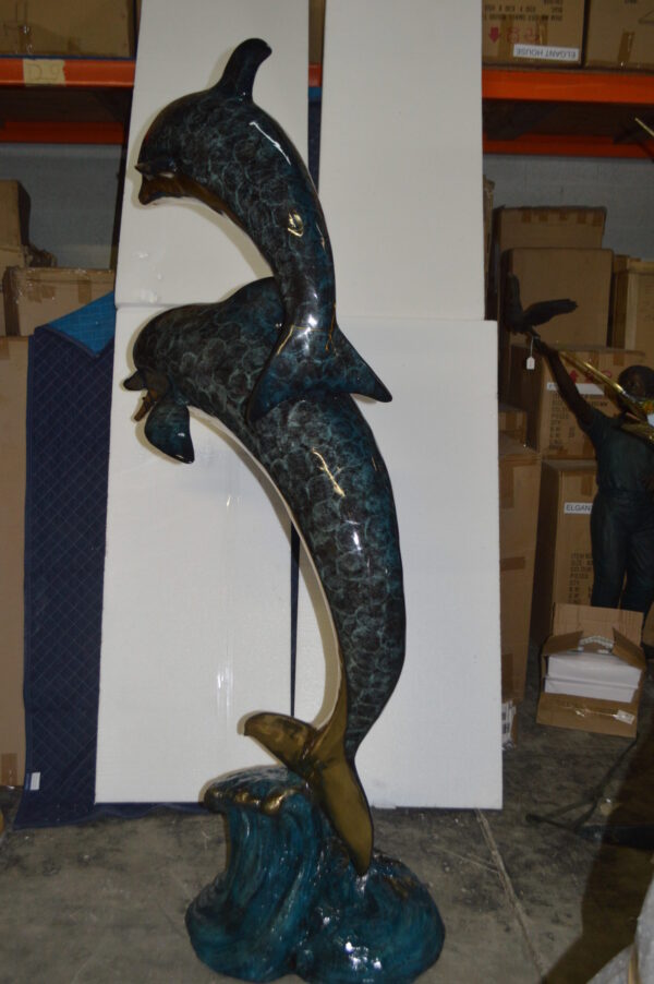 Two Dolphins Overreach Others on Waves Bronze Statue -  44"L x 23"W x 76"H.