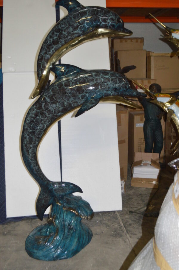 Two Dolphins Overreach Others on Waves Bronze Statue -  44"L x 23"W x 76"H.