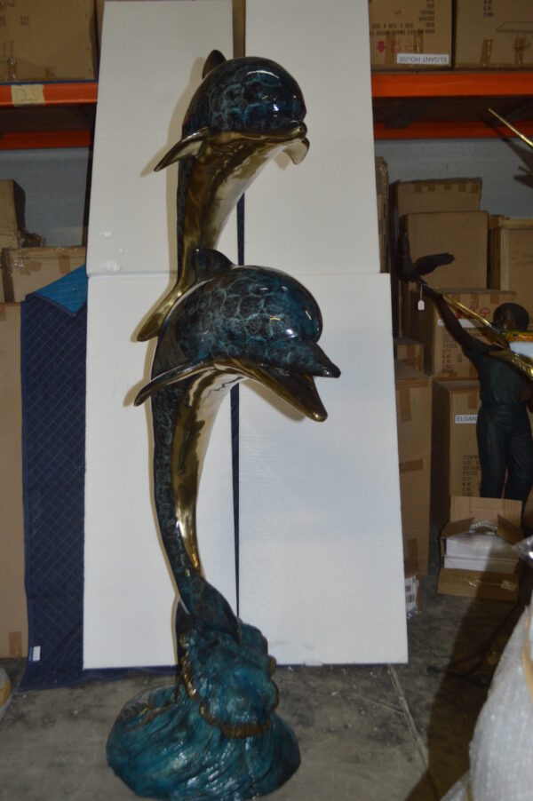 Two Dolphins Overreach Others on Waves Bronze Statue -  44"L x 23"W x 76"H.