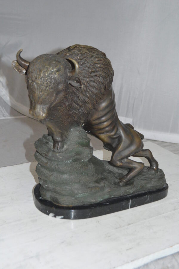 Bison Bronze Statue -  Size: 7"L x 14"W x 15"H.