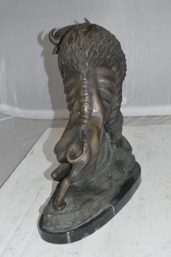 Bison Bronze Statue -  Size: 7"L x 14"W x 15"H.