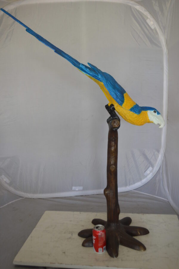 Parrot on Tree - Head Down Bronze Statue -  Size: 39"L x 15"W x 47"H.