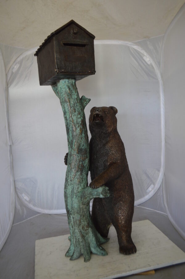 Bear beside a Tree with Mailbox Bronze Statue -  Size: 19"L x 20"W x 50"H.