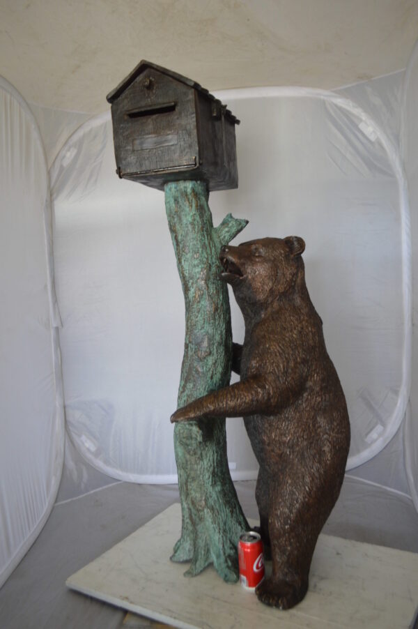 Bear beside a Tree with Mailbox Bronze Statue -  Size: 19"L x 20"W x 50"H.