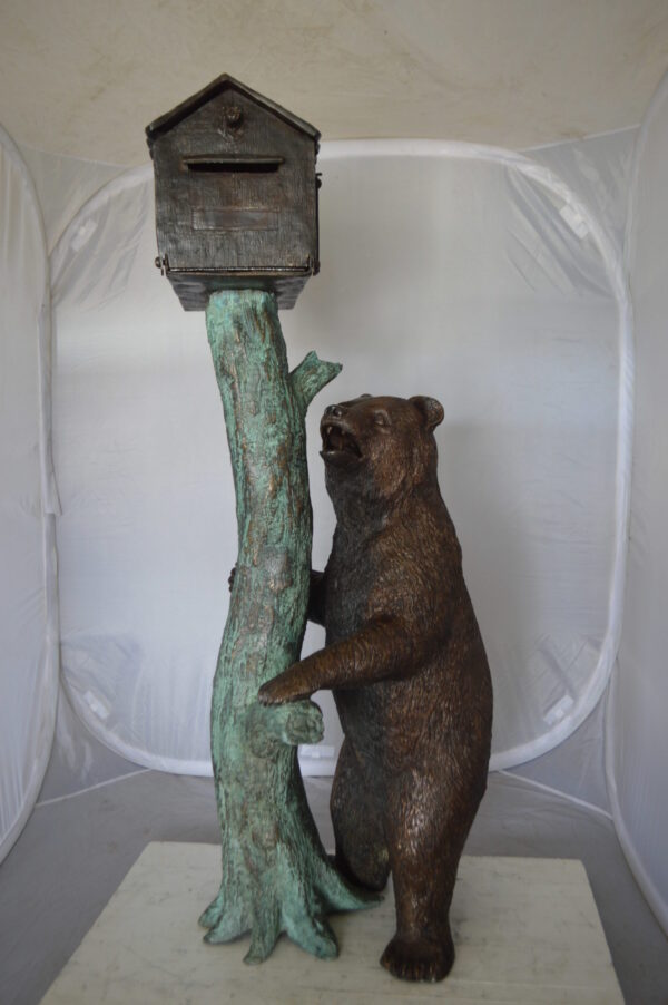 Bear beside a Tree with Mailbox Bronze Statue -  Size: 19"L x 20"W x 50"H.