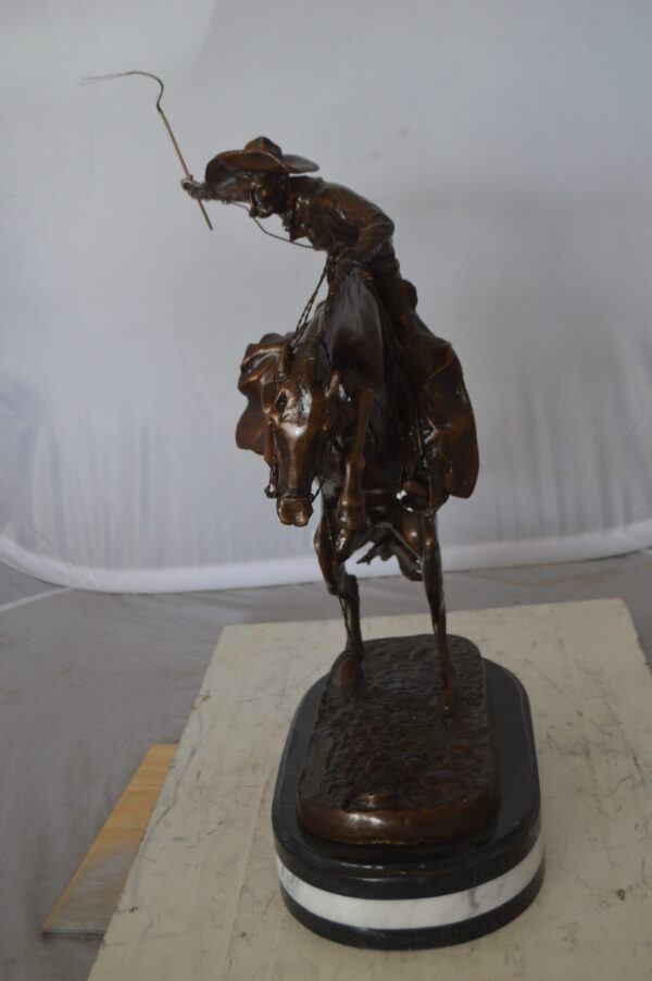 Bronco Buster by Remington Bronze Statue on a triple marble -  21"x 10"x 26"H.
