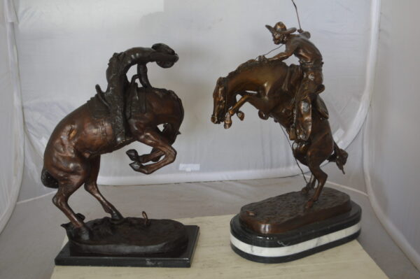 Bronco Buster by Remington Bronze Statue on a triple marble -  21"x 10"x 26"H.