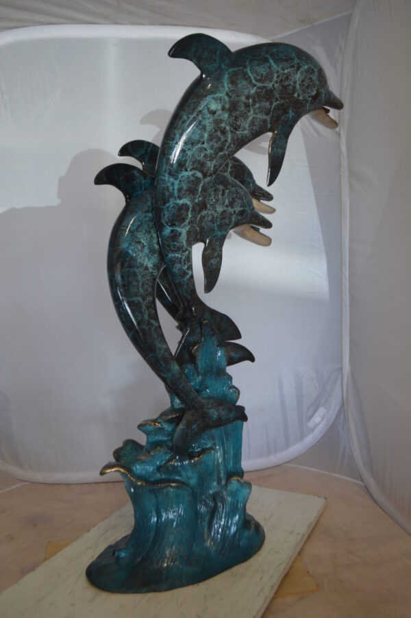 Three Dolphin Fountain  Bronze Statue -  Size: 21"L x 26"W x 45"H.