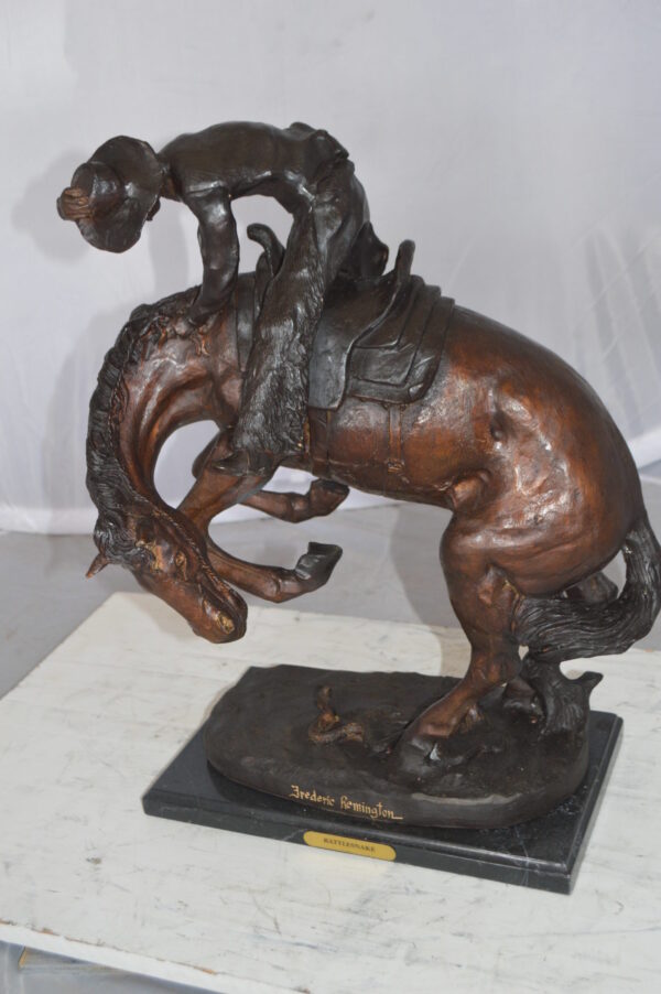 Rattlesnake by Remington Bronze Statue -  Size: 16"L x 13"W x 22"H.