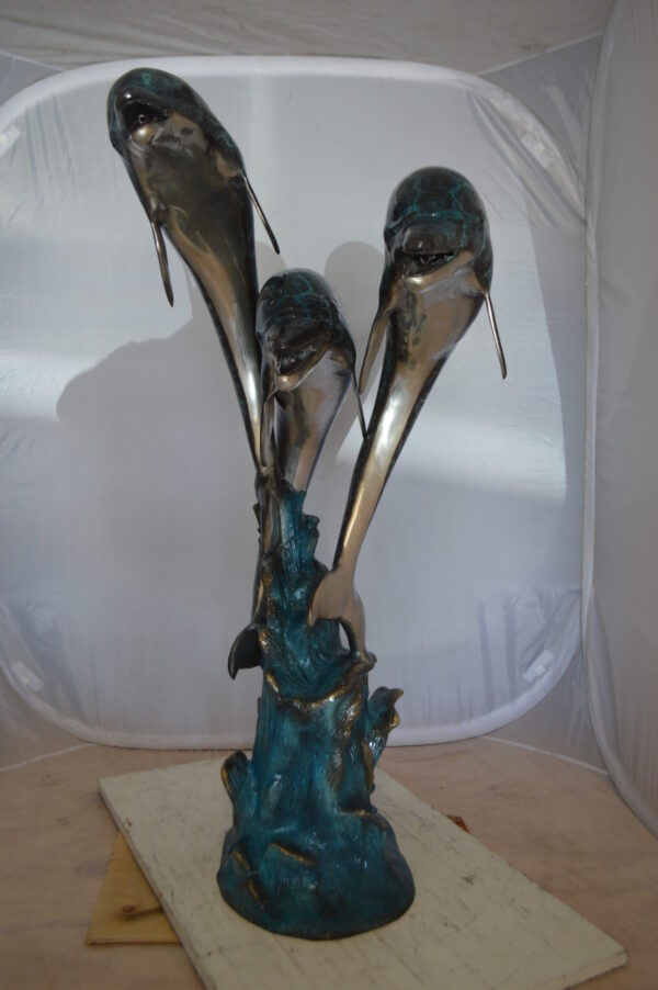 Three Dolphin Fountain  Bronze Statue -  Size: 21"L x 26"W x 45"H.