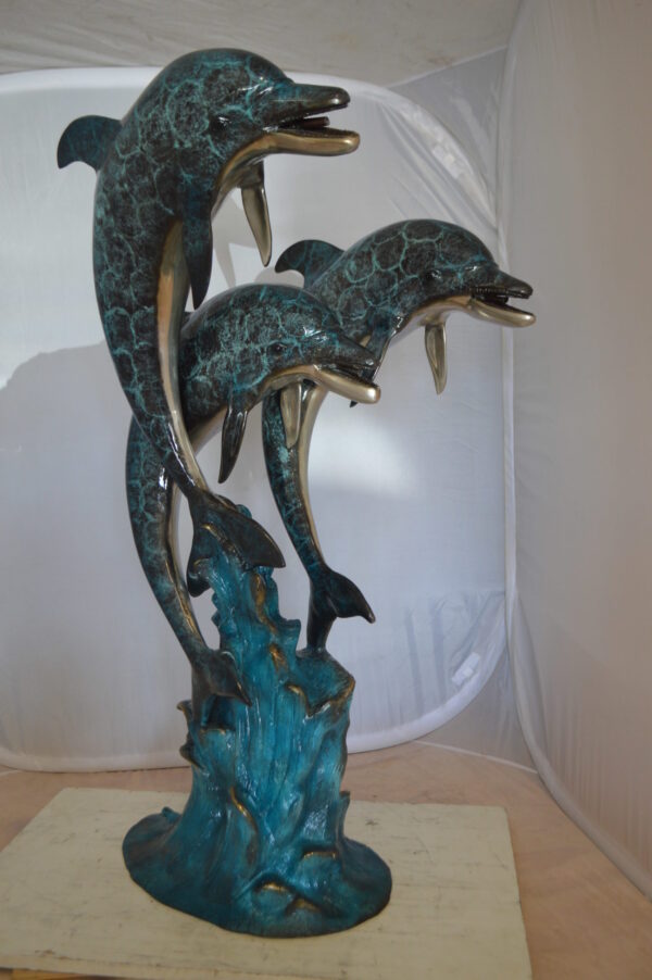 Three Dolphin Fountain  Bronze Statue -  Size: 21"L x 26"W x 45"H.