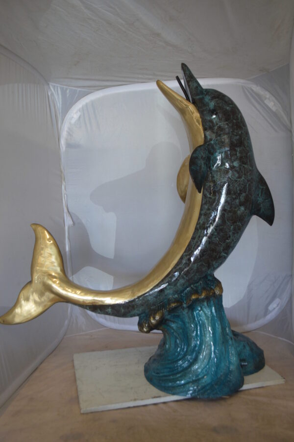 Single Dolphin  On Wave Fountain Bronze Statue -  Size: 48"L x 24"W x 53"H.