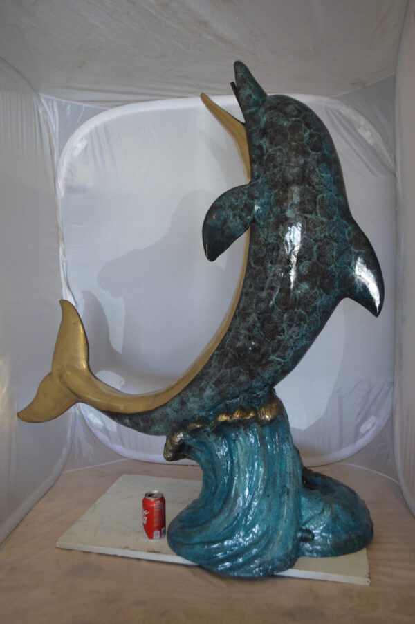 Single Dolphin  On Wave Fountain Bronze Statue -  Size: 48"L x 24"W x 53"H.