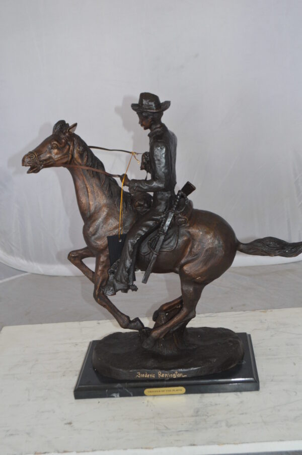 Trooper of the Plains Bronze Statue by Remington -  Size: 9"L x 22"W x 22"H.