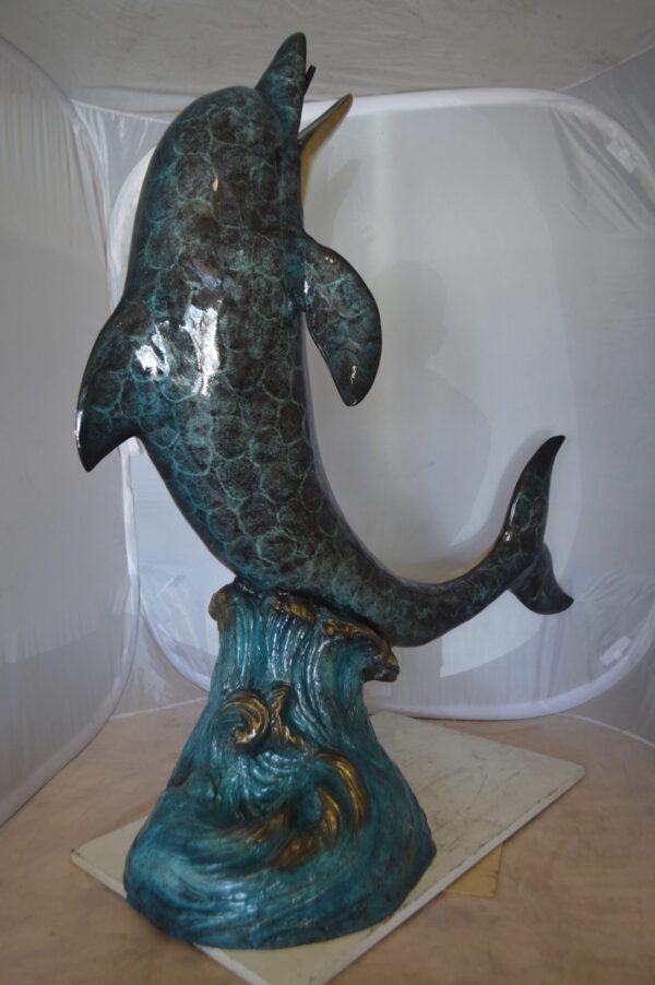 Single Dolphin  On Wave Fountain Bronze Statue -  Size: 48"L x 24"W x 53"H.