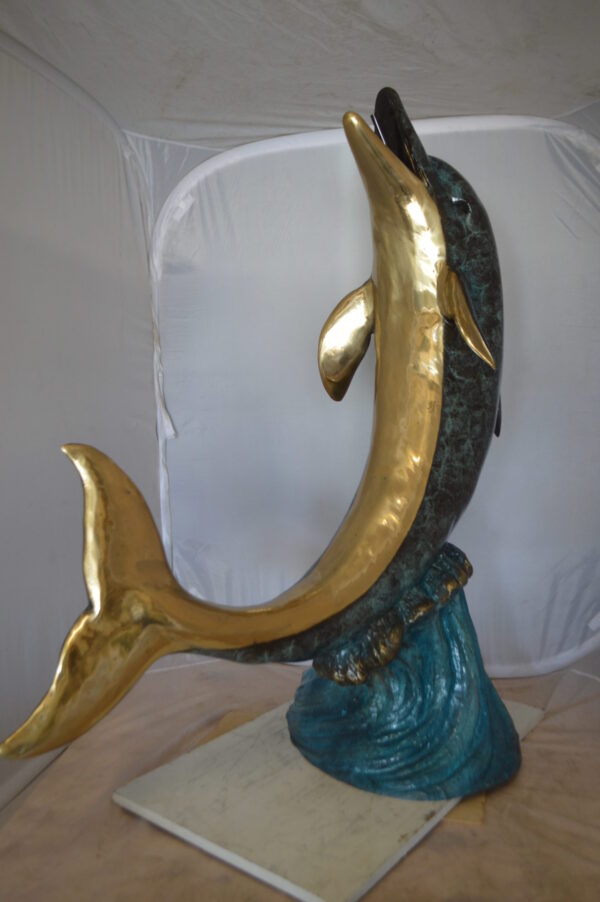 Single Dolphin  On Wave Fountain Bronze Statue -  Size: 48"L x 24"W x 53"H.