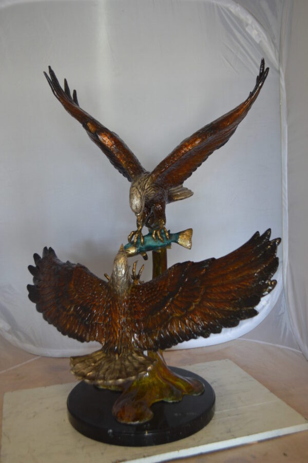 Two Eagles Fighting on Fish Bronze Statue -  Size: 33"L x 28"W x 42"H.