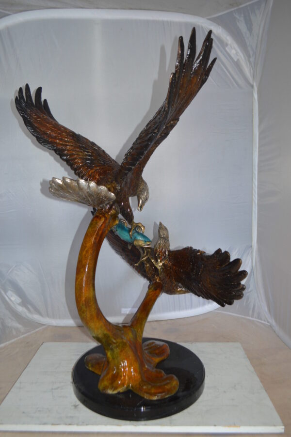 Two Eagles Fighting on Fish Bronze Statue -  Size: 33"L x 28"W x 42"H.