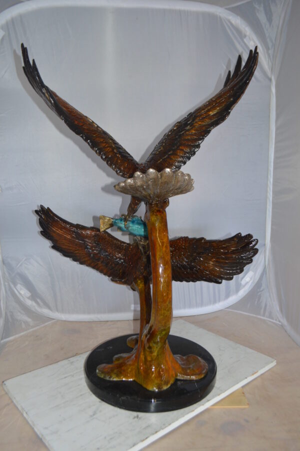 Two Eagles Fighting on Fish Bronze Statue -  Size: 33"L x 28"W x 42"H.