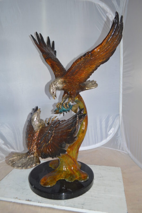 Two Eagles Fighting on Fish Bronze Statue -  Size: 33"L x 28"W x 42"H.