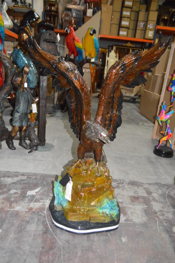 Eagle On A Rock Bronze Statue -  Size: 32"L x 18"W x 48"H.