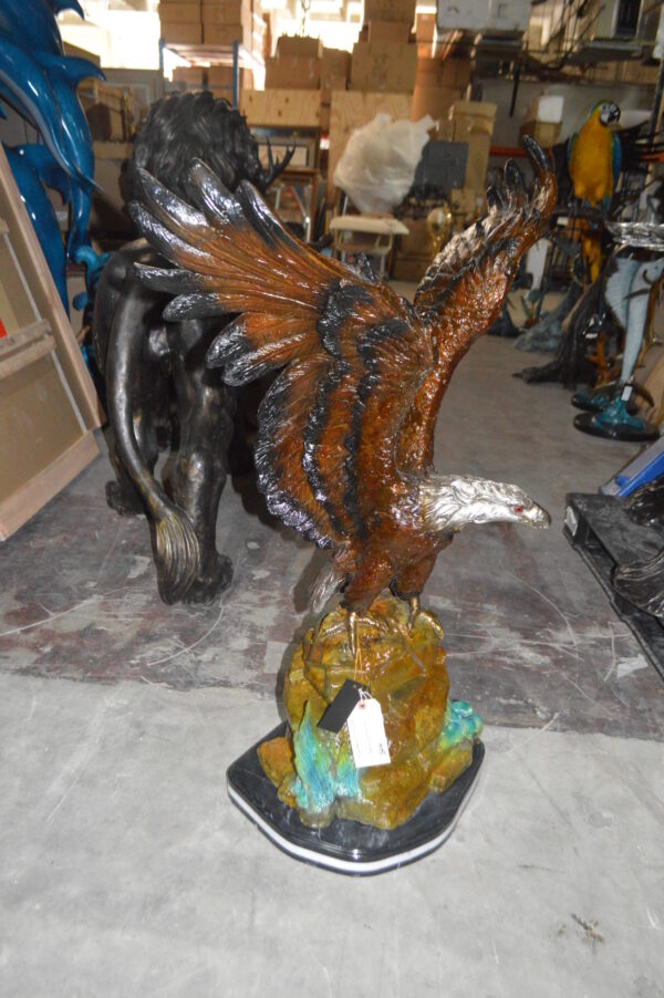 Eagle On A Rock Bronze Statue -  Size: 32"L x 18"W x 48"H.