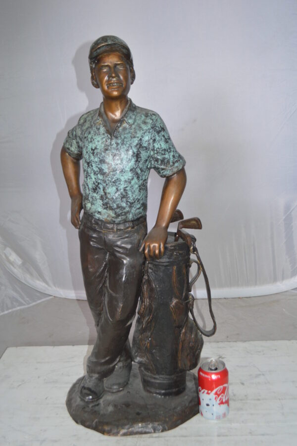 Golfer with bag Bronze Statue -  Size: 12"L x 13"W x 32"H.