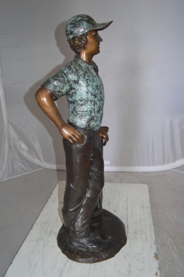 Golfer with bag Bronze Statue -  Size: 12"L x 13"W x 32"H.
