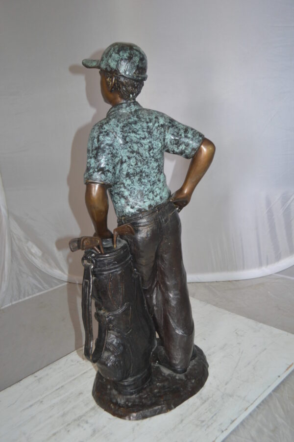 Golfer with bag Bronze Statue -  Size: 12"L x 13"W x 32"H.