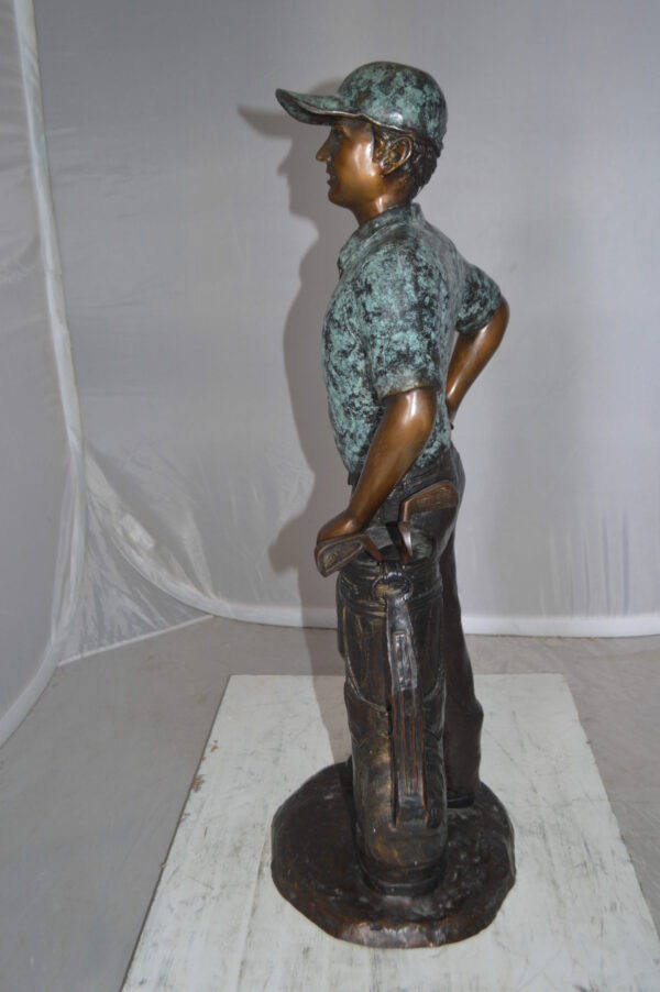 Golfer with bag Bronze Statue -  Size: 12"L x 13"W x 32"H.