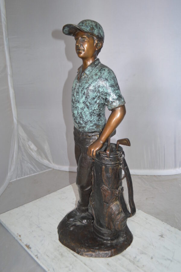 Golfer with bag Bronze Statue -  Size: 12"L x 13"W x 32"H.
